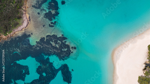 Aerial drone footage of the crystalline sea of ​​Sardinia. Tuerredda beach and white sand. photo