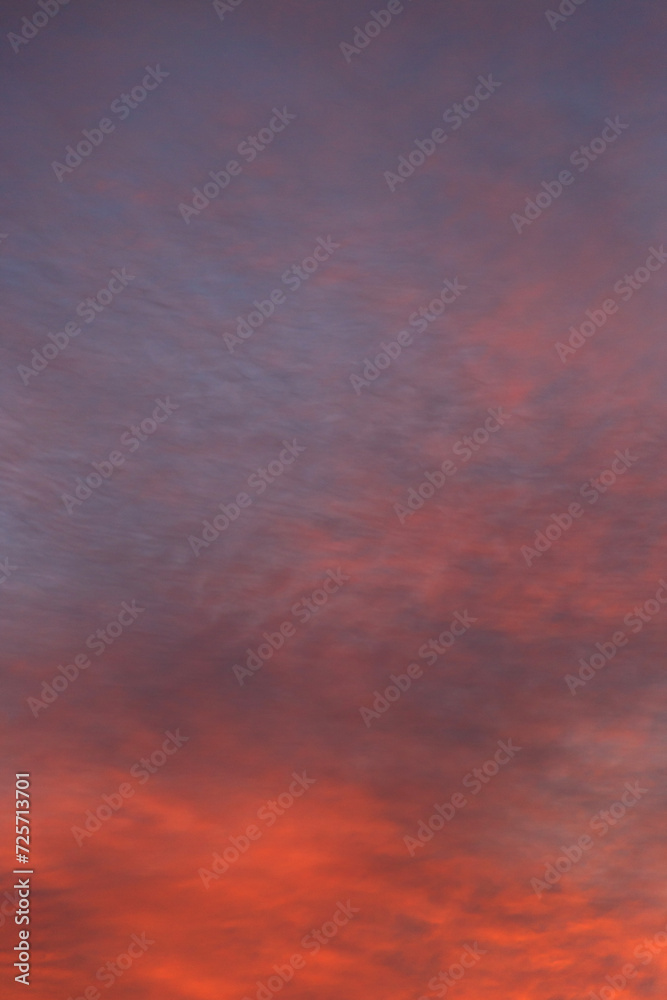 A stunning pink, orange and violet clouds at sunrise sky. Sunset sky background.