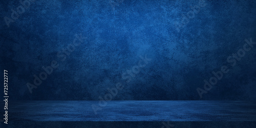 blue navy color studio background with light from above. leather texture backdrop for design. space for selling products on the website. banner background for advertising. photo