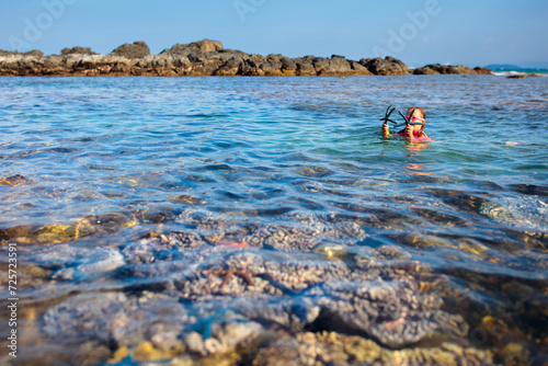 Child snorkeling. Kids underwater. Beach and sea. © famveldman