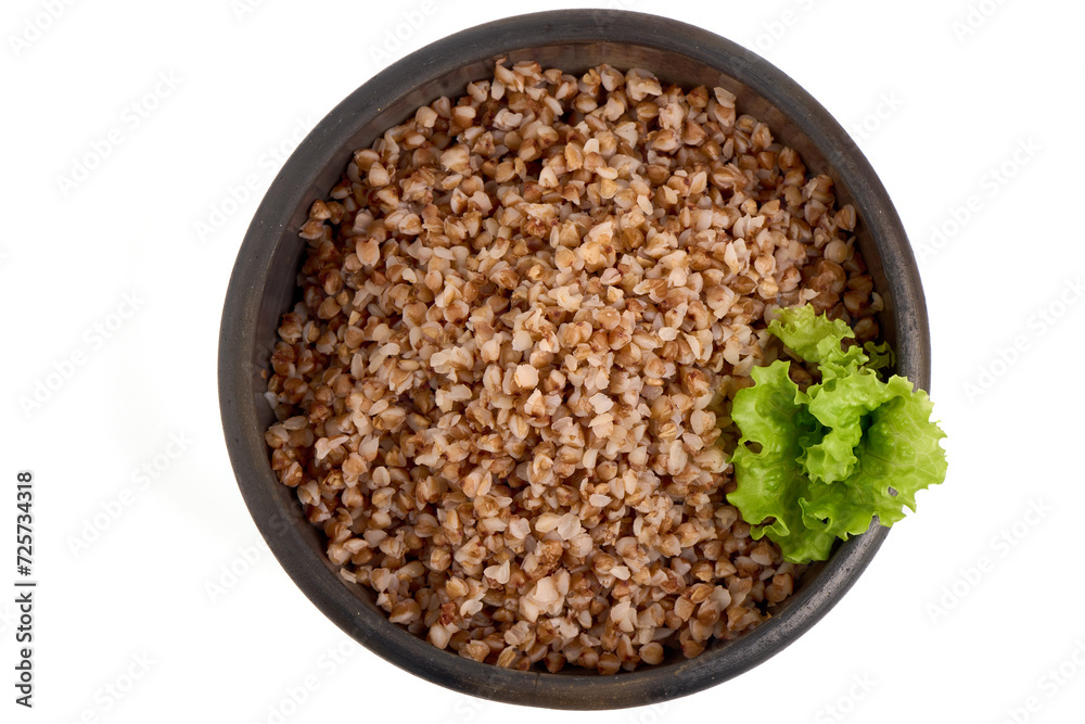 Buckwheat in a pot, isolated on white background. Buckwheat in a pot, isolated on white background.