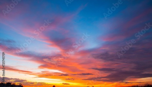 fiery sunset colorful clouds in the sky © Diann