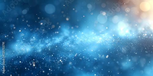 Abstract blue background with defocused glittering lights and blurred circles