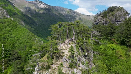 Aerial view of the beautiful viewpoint Zlijeb on Cvrsnica mountain in Bosnia and Herzegovina. Beautiful viewpoint surrounded by green trees and mountains. photo