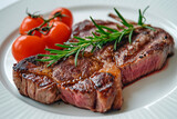 Large steak on a large white plate, high key, rosemarine 