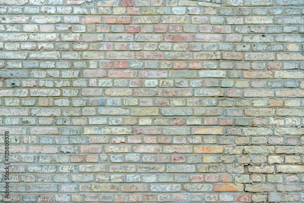 Fototapeta premium Old grunge textured background of chalked empty large brick wall with copy space and mock up, front view
