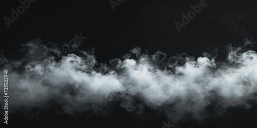 A captivating image featuring smoke emerging from a black background. Perfect for adding a mysterious and dramatic touch to various projects