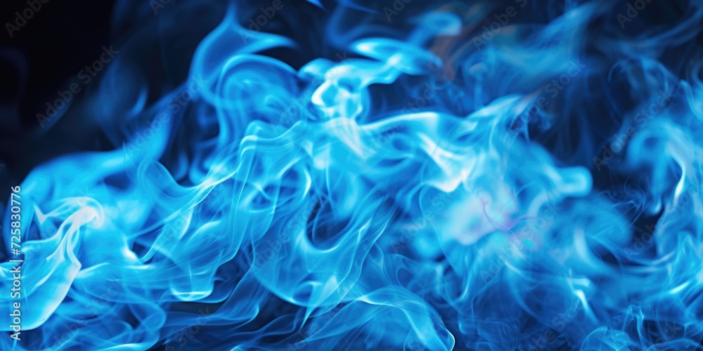 Blue smoke captured in a close-up shot against a black background. Perfect for adding a touch of mystery and elegance to your design projects Blue smoke captured in a close-up shot against a black background. Perfect for adding a touch of mystery and elegance to your design projects