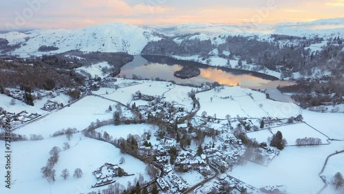 Aerial snow covered landscape around the famous village of Grasmere, Lake District National Park, Cumbria, England photo