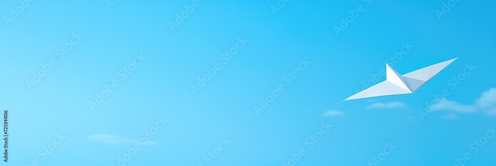 Paper airplane on a blue background. Wide format banner Paper airplane on a blue background. Wide format banner