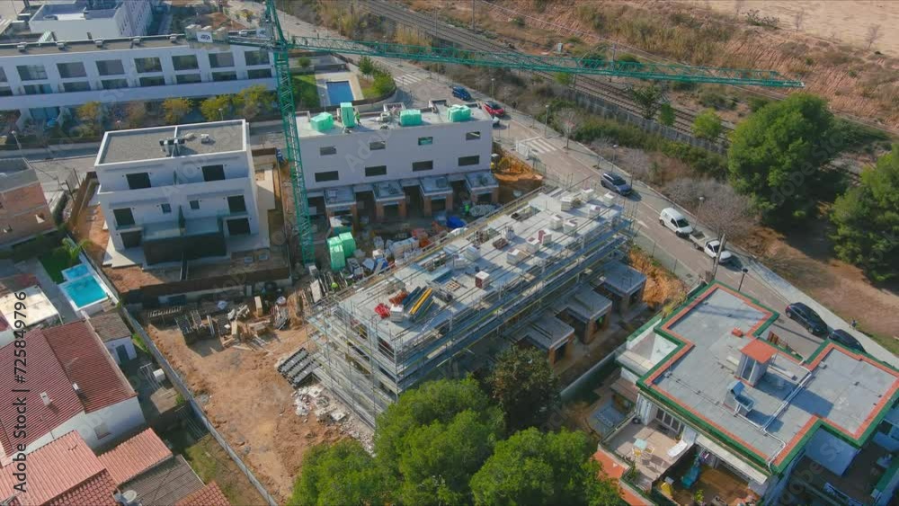 Aerial Construction and Coastal Vibe in Sitges Cityscape Aerial Construction and Coastal Vibe in Sitges Cityscape