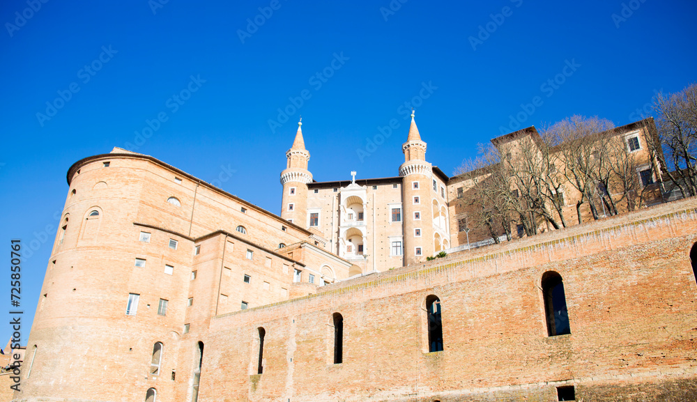 Bottom view of the Ducal Palace in Urbino, Marche, Italy. It is the main monument of the city. It was an important center of the Italian Renaissance and the entire structure is a world heritage site.