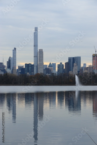 New York City skyline from Central Park Lake with reflection in the water