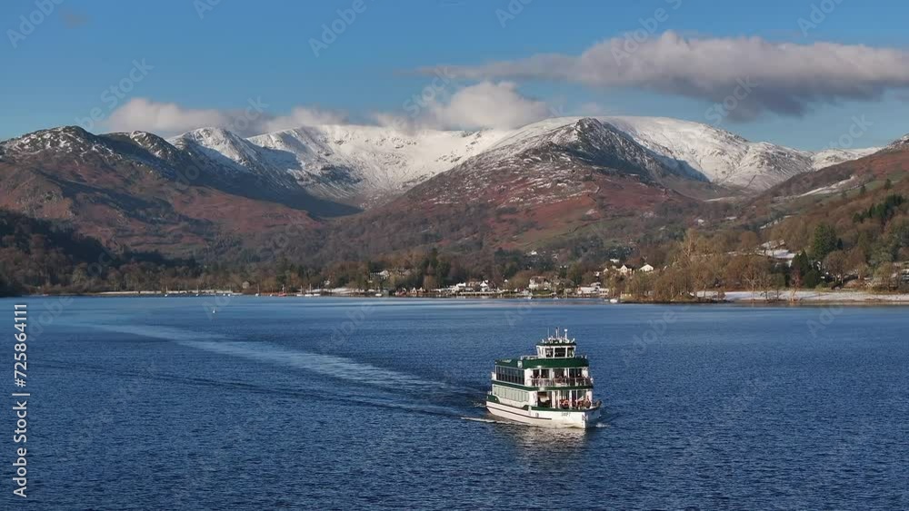 Ferry leaving the village of Ambleside, Lake Winderemere, Lake District National Park, Cumbria, England