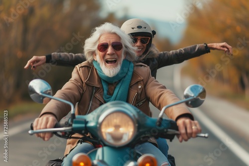 A cheerful elderly couple rides a motorcycle along the highway towards adventure. Happy active old age