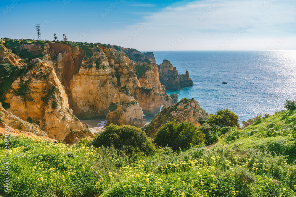 Picturesque cliff walk along the Lagos coastline, Algarve, Portugal