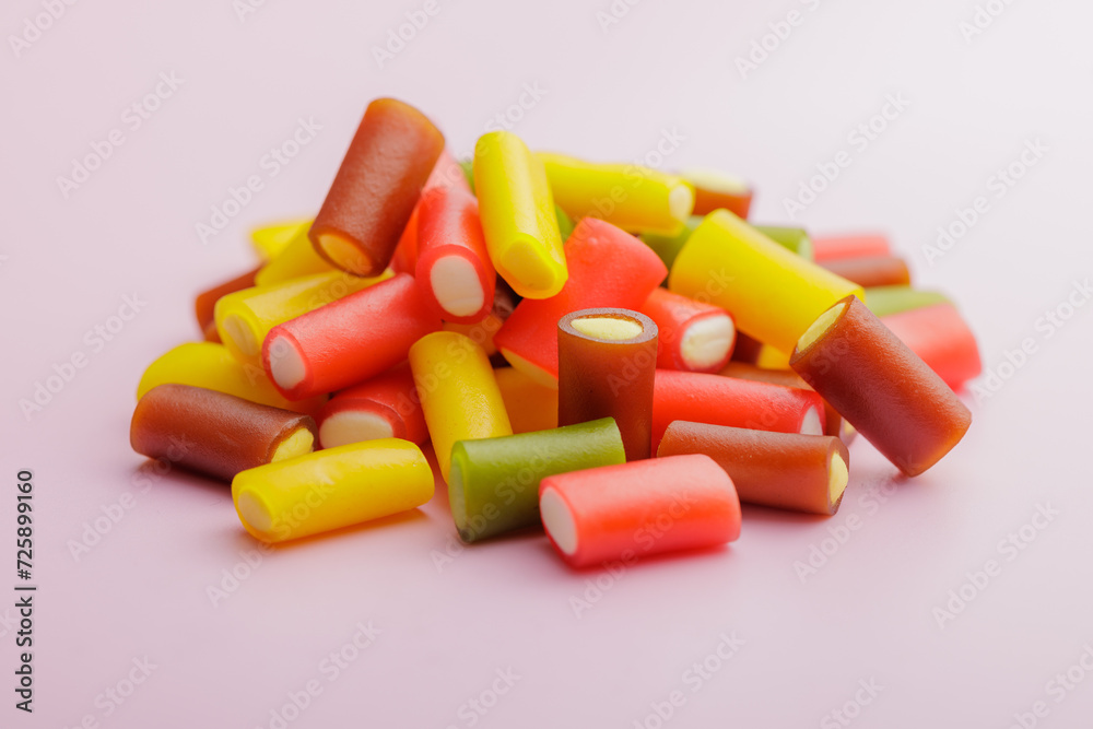 Colorful sweet jelly candies on pink background. Colorful sweet jelly candies on pink background.