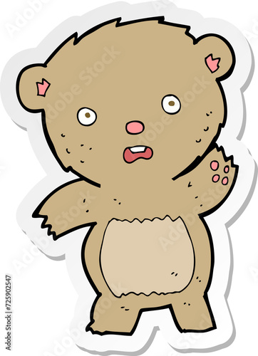 sticker of a cartoon unhappy teddy bear