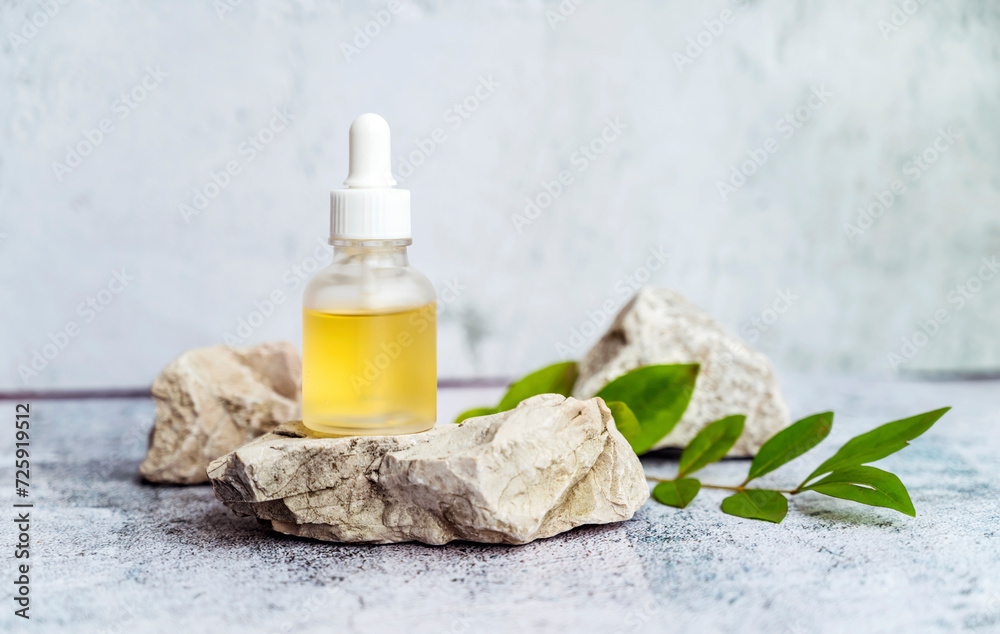 Glass bottle with dropper lid with organic cosmetic product, serum Glass bottle with dropper lid with organic cosmetic product, serum