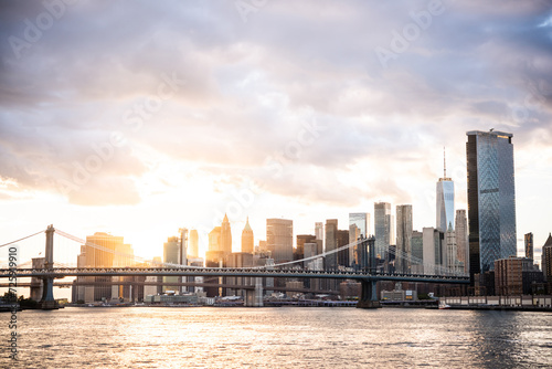 View of Lower Manhattan skyline and Manhattan Bridge seen from the East River in New York City  United States.