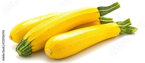 Isolated zucchini squash in yellow on white background.