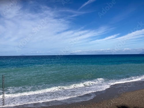 Blue Sky with Clouds and Waves       Sicily        Capo d Orlando        Isole        Italy   