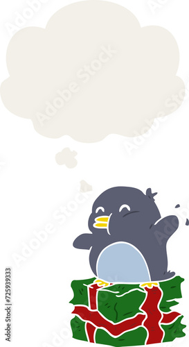 cartoon penguin on present and thought bubble in retro style
