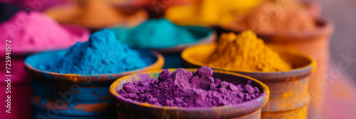 Colorful powder paints in pots at a market in India. Festival of colors in India, Holi. The arrival of spring, the victory of good over evil. Happiness.