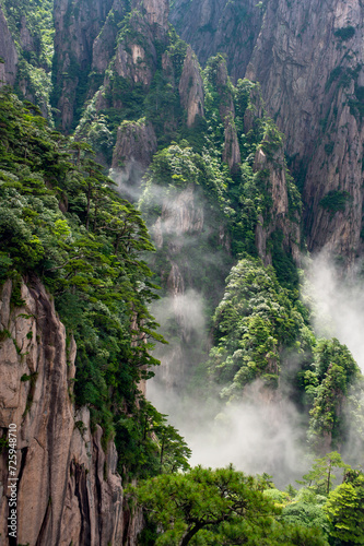 Clouds float amidst the Second Ring Road in the West Sea  Xihai  Grand Canyon of Huangshan Yellow Mountains.