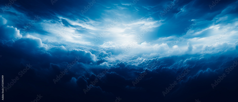 Ethereal clouds in dark navy and white, realistic dreamlike atmosphere. Aerial view with strong contrast, chiaroscuro effect. Blue clouds above a dark sky, worthy high detail