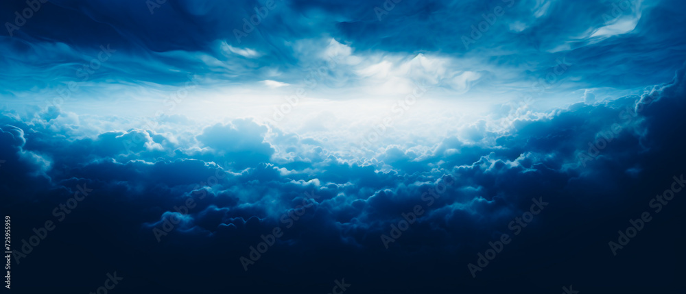 Ethereal clouds bathed in blue light, dark navy and white hues. Realistic yet dreamlike, high-angle view with mist, dreamlike horizons. Chiaroscuro contrast for a captivating atmosphere. National Geog
