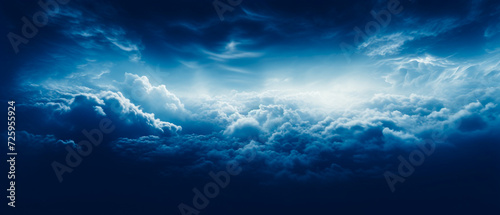 Ethereal clouds in dark navy and white with dreamlike horizons. High-angle aerial view, strong contrast, and chiaroscuro. Quality in detailed, realistic capture