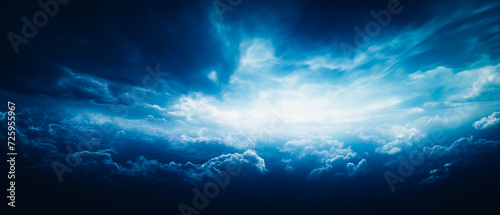 Captivating clouds in dark navy and white, ethereal yet realistic. Aerial view with dreamlike horizons, high detail. Chiaroscuro effect, blue clouds above a dark blue sky