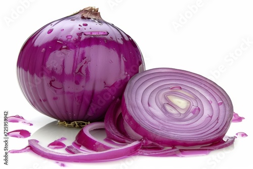 Purple Onion Sliced in Half Next to a Knife