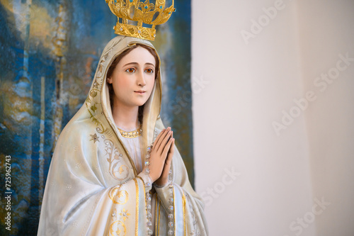 Statue of Our Lady of Fatima. Igreja de Nossa Senhora de Fátima (Church of Our Lady of Fatima) – Bairro Padre Cruz, Lisbon, Portugal.
