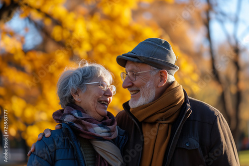 senior couple laughing in the park