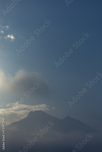 cerro de la silla in monterrey, mexico on a sunney day that turn on cloudy photo