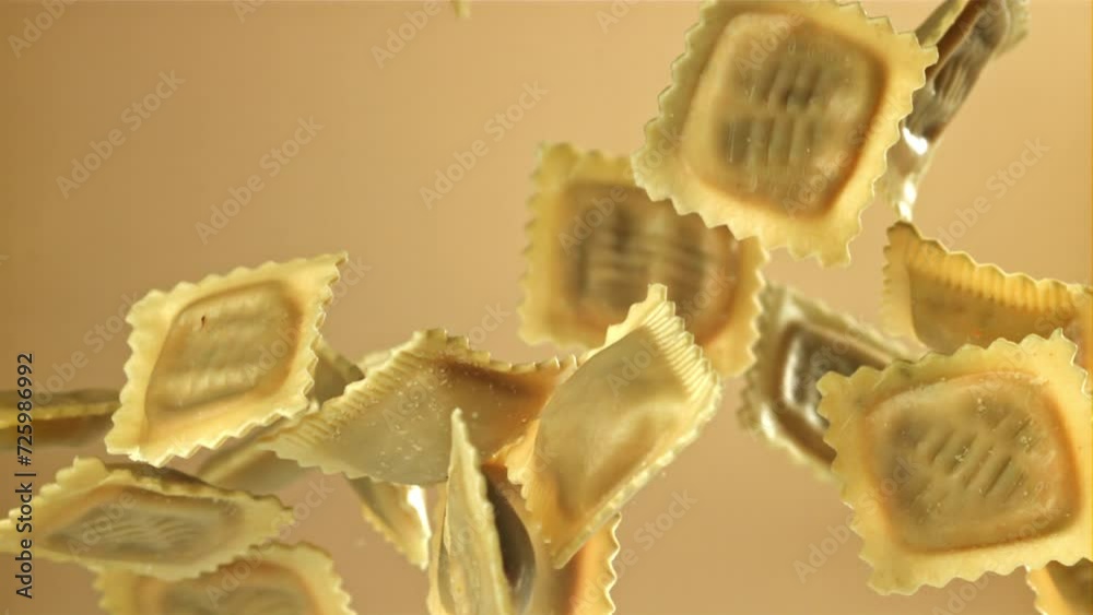 Ravioli fly up and fall down. Filmed on a high-speed camera at 1000 fps. High quality FullHD footage Ravioli fly up and fall down. Filmed on a high-speed camera at 1000 fps. High quality FullHD footage
