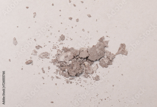 Photos Silver chloride (AgCl) darkened from light, the product of the reaction of silver nitrate with sodium chloride, decanted and dried
