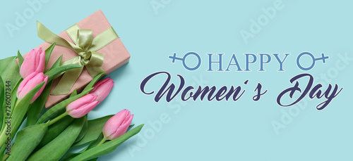 Gift box and bouquet of beautiful tulips on light blue background. Banner for International Women's Day