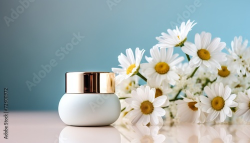 White Vase With Gold Lid Next to White Daisies