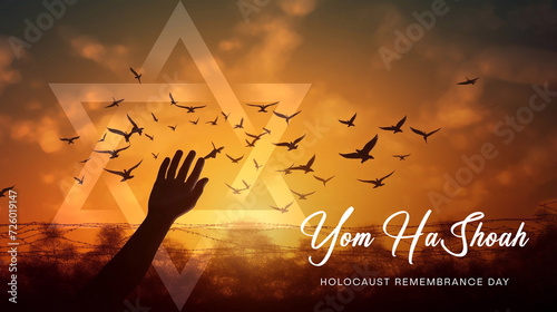 Yom HaShoah. Holocaust Remembrance Day. Birds Silhouette Flying in the barbed wire fence photo