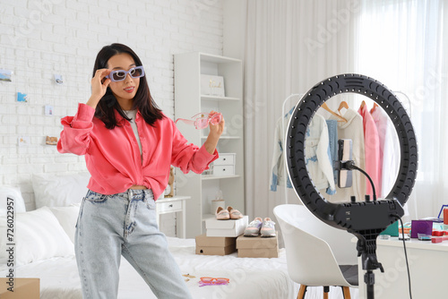 Female Asian fashion blogge...