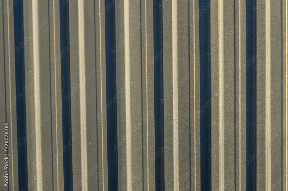 Fototapeta premium profile metal sheet as a background in the sun 1