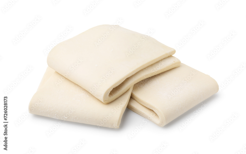 Raw puff pastry dough isolated on white Raw puff pastry dough isolated on white