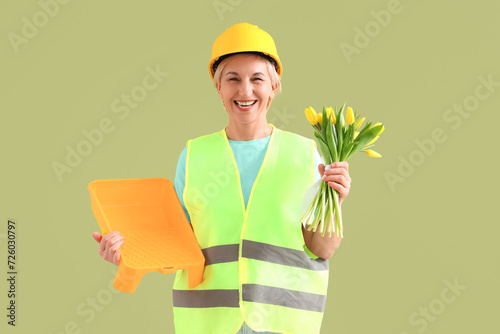 Mature female worker with t...