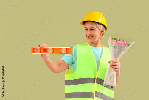 Mature female worker with t...