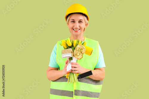 Mature female worker with t...