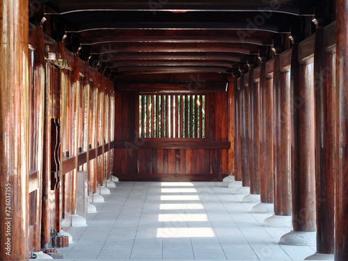 Beautiful wooden corridor of Baoshan Temple in Baoshan district, Shanghai, China. Bathed in summer sunlight. photo