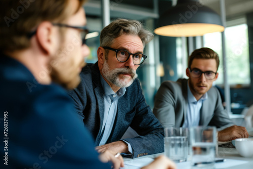 A man at a business meeting. Background with selective focus and copy space